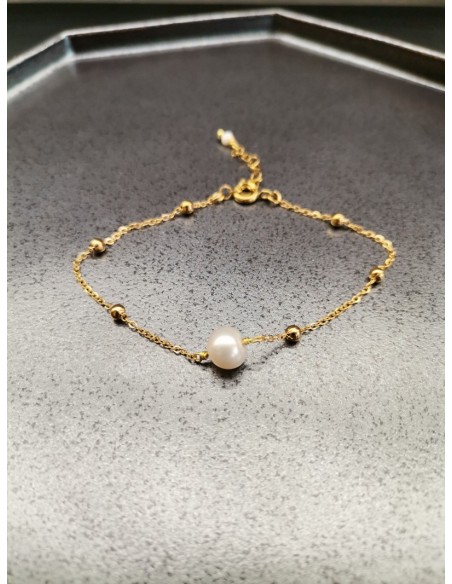 Řetízkový náramek zlatý s perličkou a kulatými zlatými prvky|PIOU PIOU-1