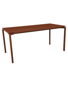 Kovový stůl Calvi 126x63 s matnou deskou, INDOOR  | FERMOB red ochre